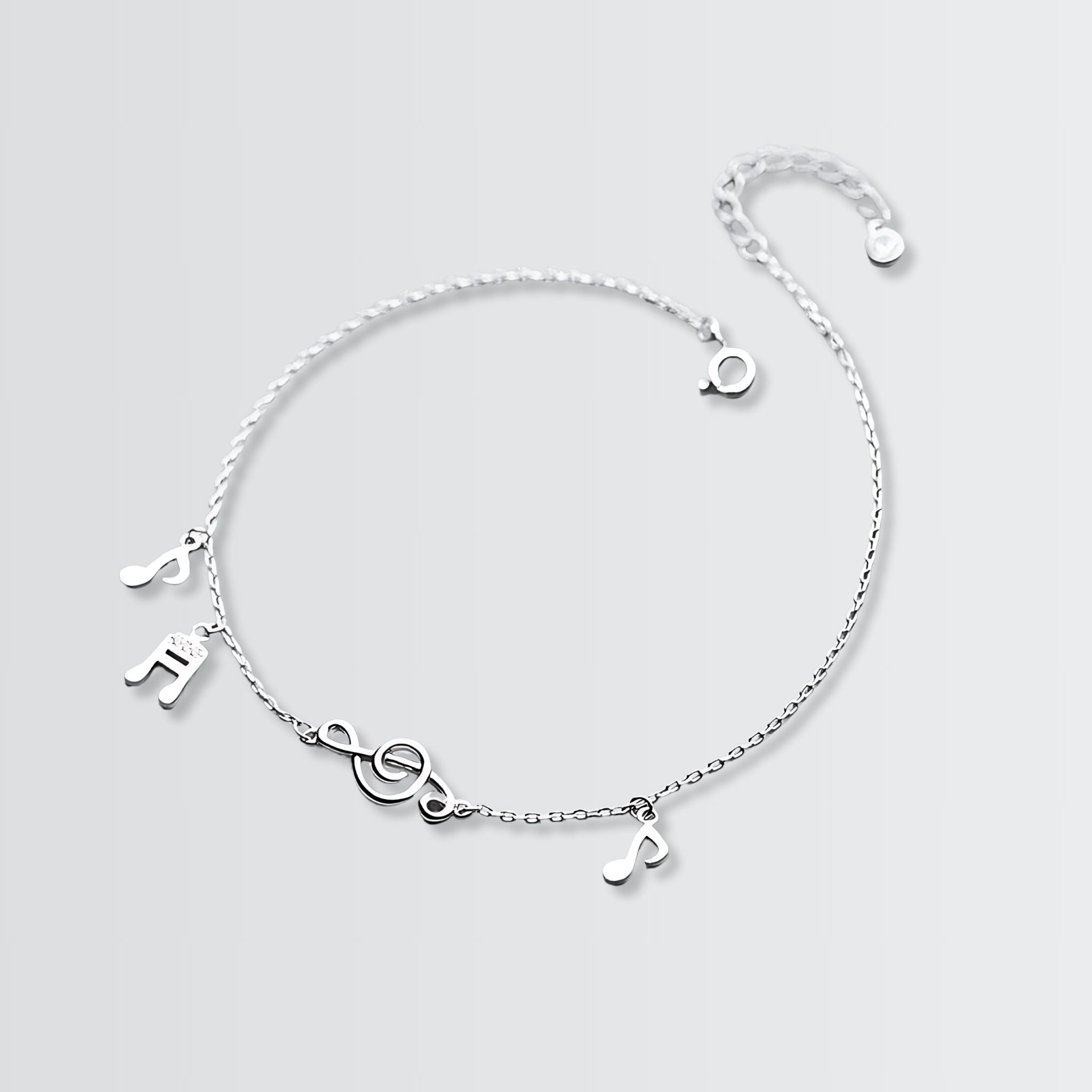Mon bracelet de cheville avec des notes de musique