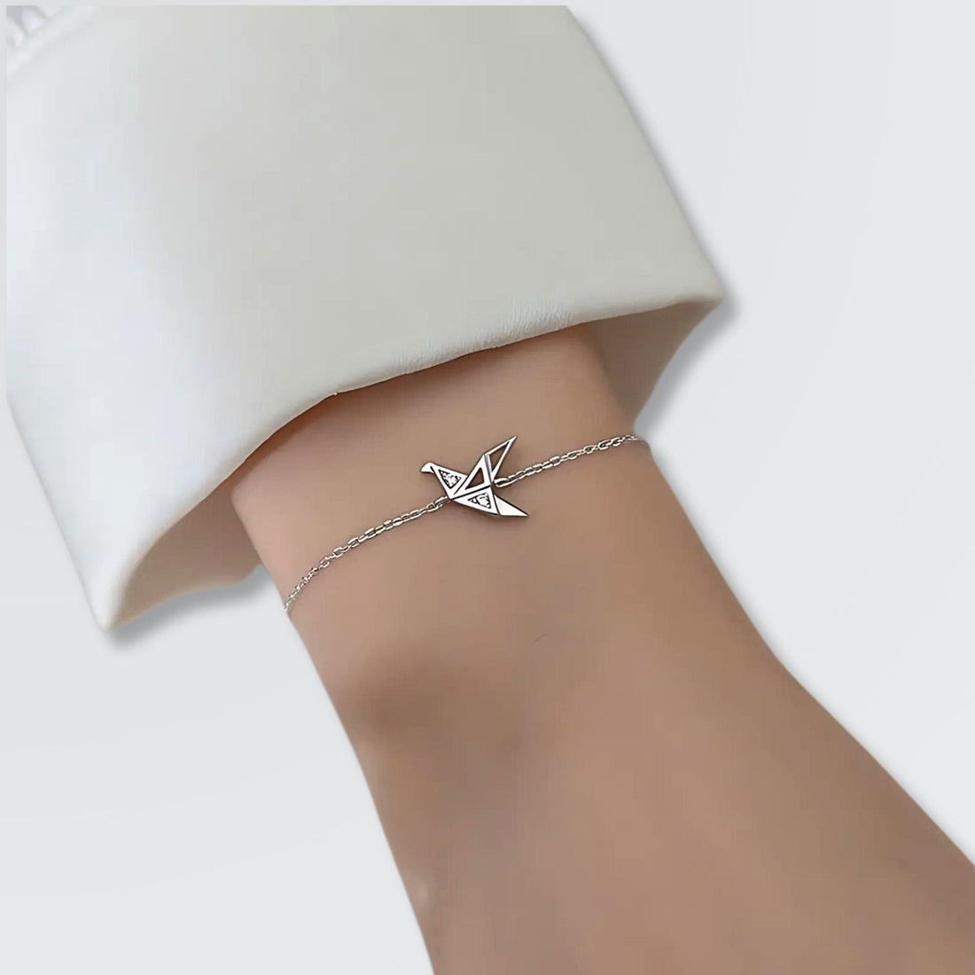 Bracelet minimaliste en origami avec oiseau