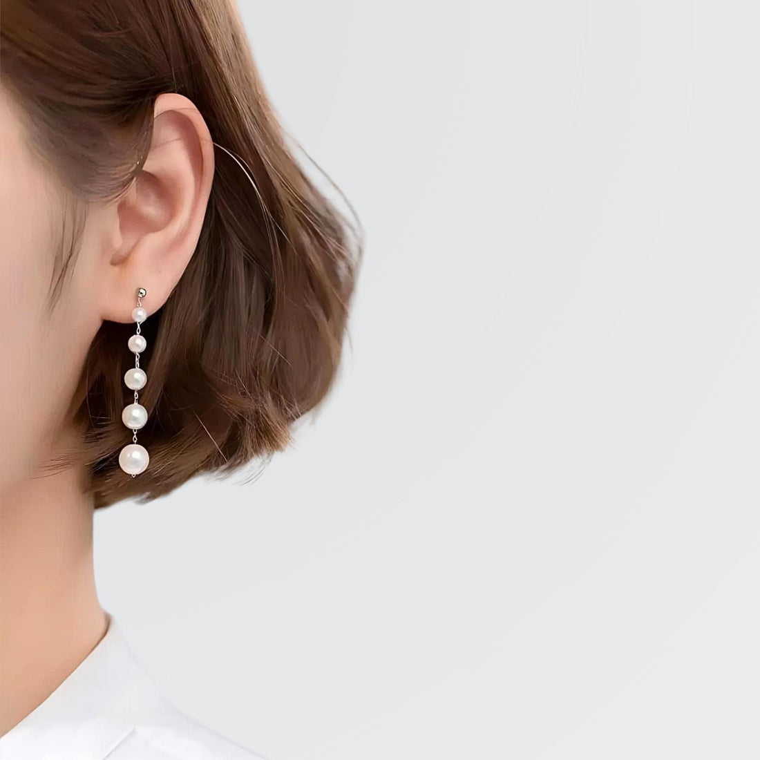 Pendientes de araña con perlas lineales