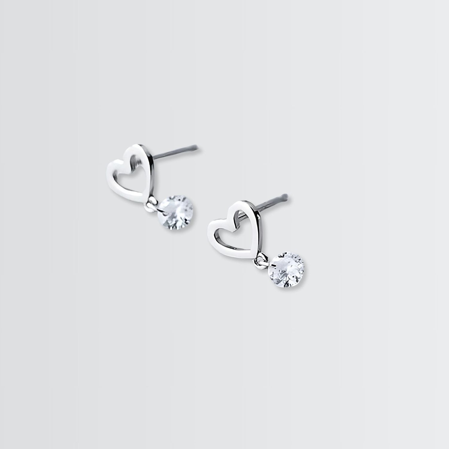 Swaying Solitaire On Heart Minimal Studs