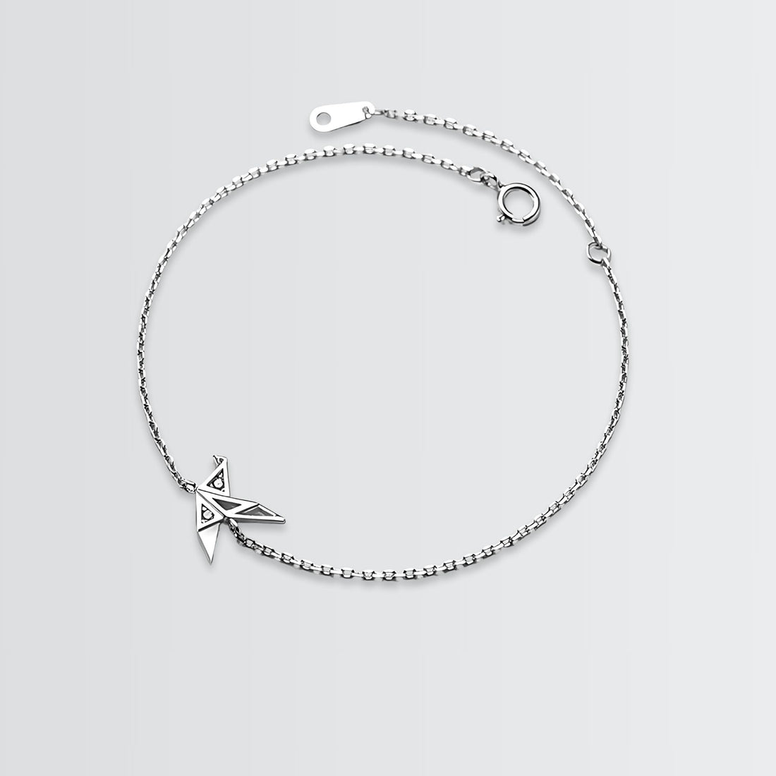 Bracelet minimaliste en origami avec oiseau