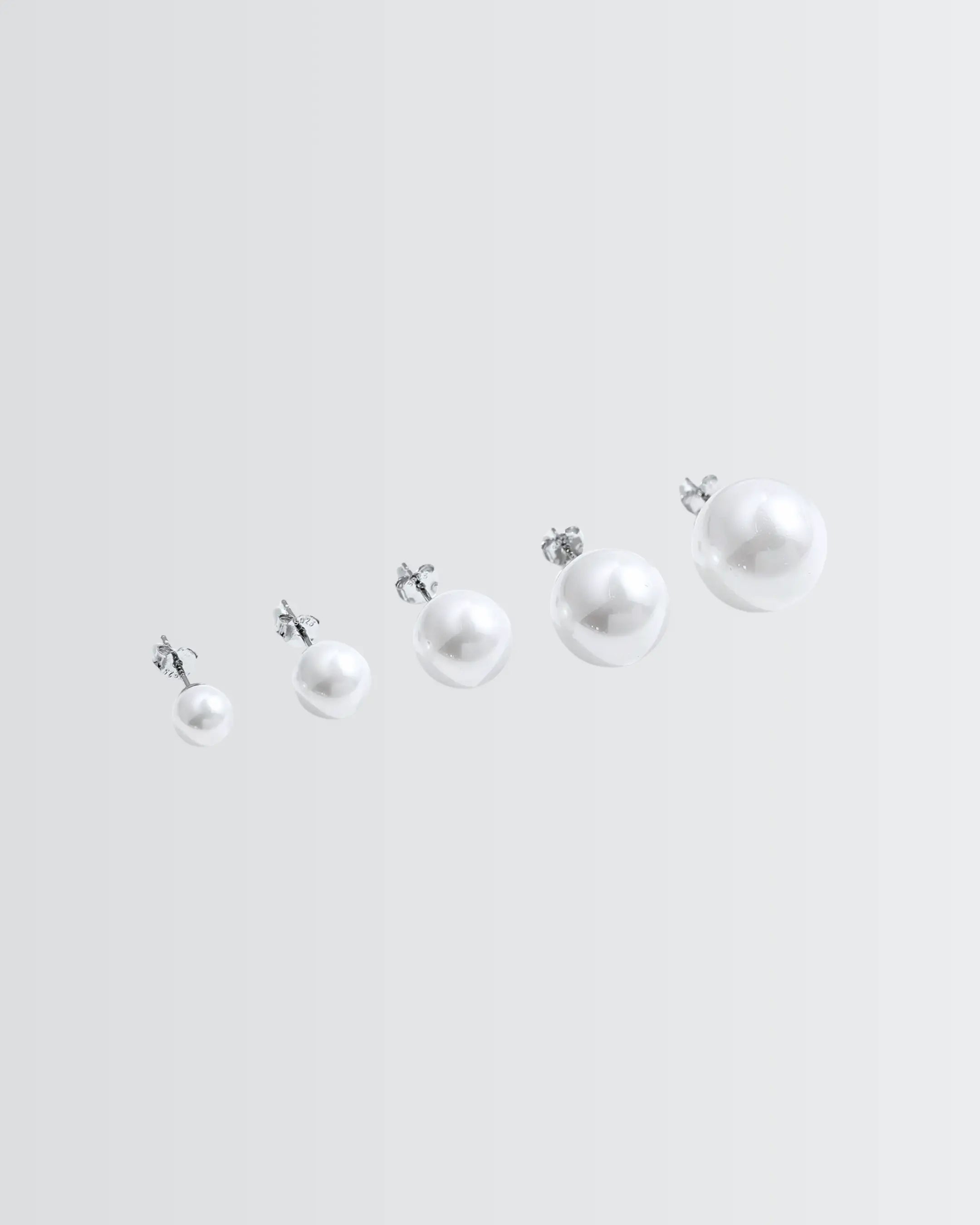 Gleaming Pearl Studs -  Silver Earrings by BLINGLANE