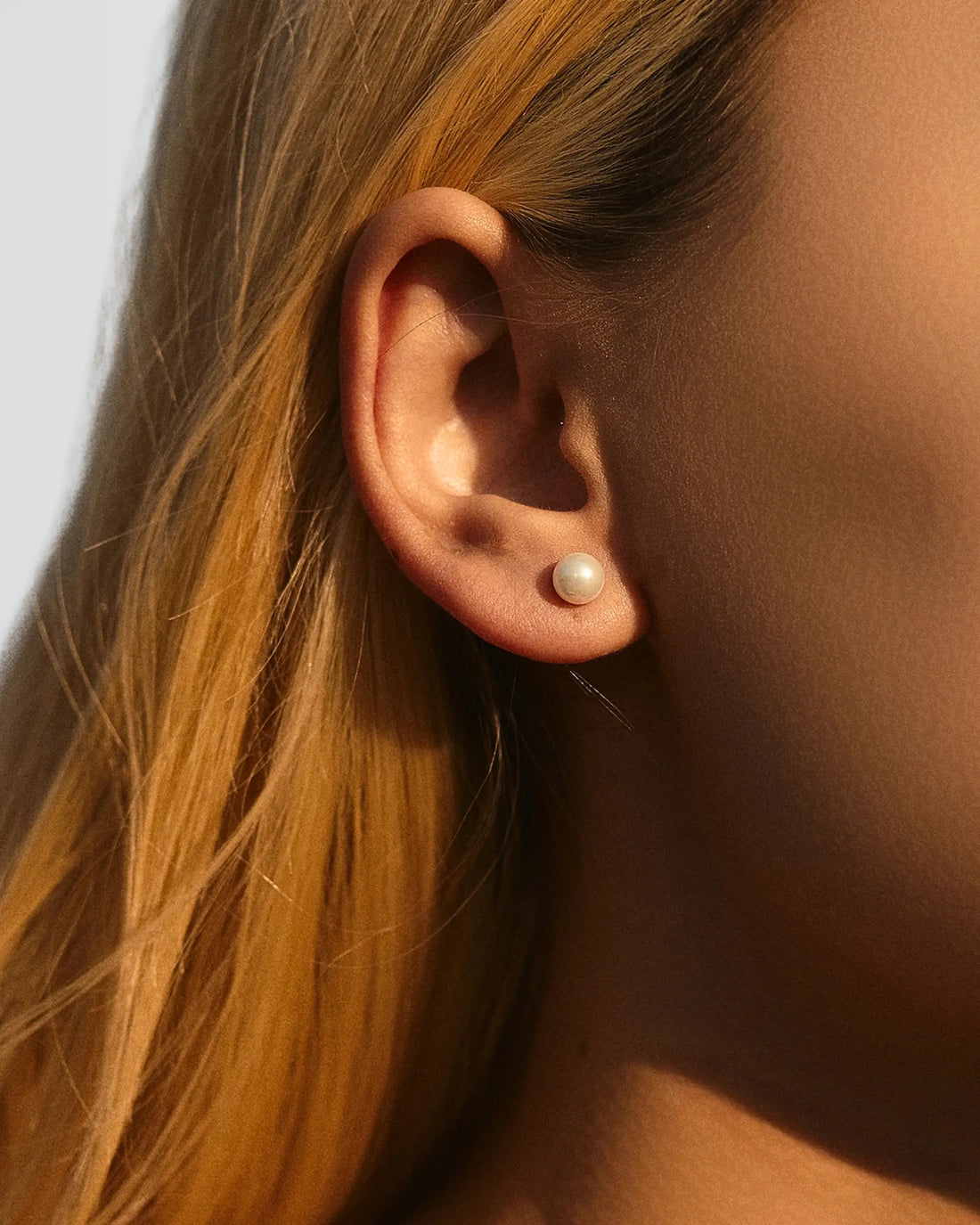 Gleaming Pearl Studs -  Silver Earrings by BLINGLANE