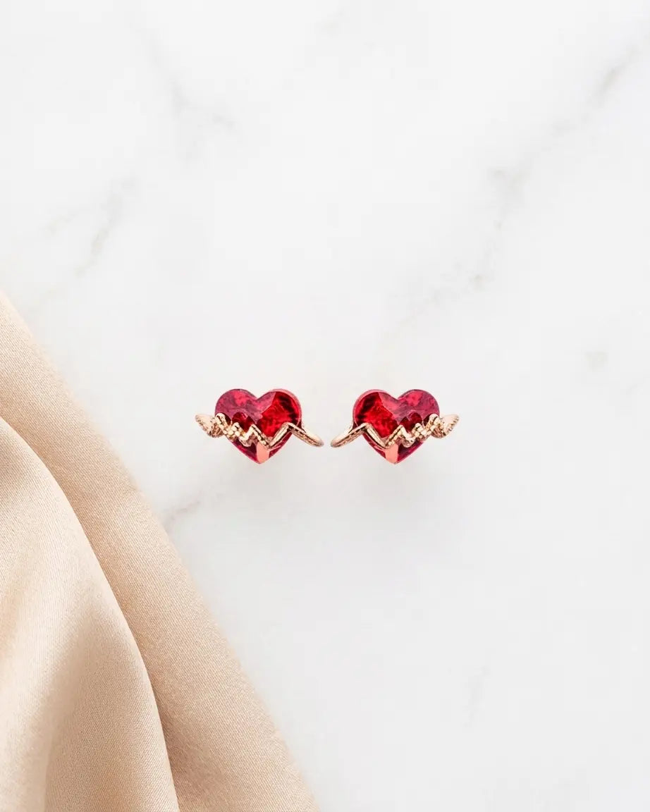 Heartflow Mini Studs -  Silver Earrings by BLINGLANE