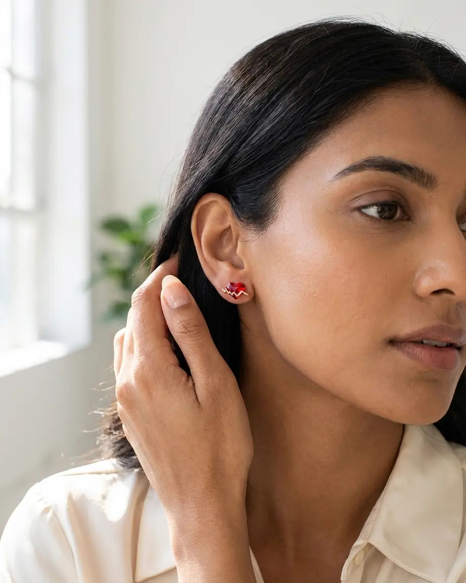 Heartflow Mini Studs -  Silver Earrings by BLINGLANE