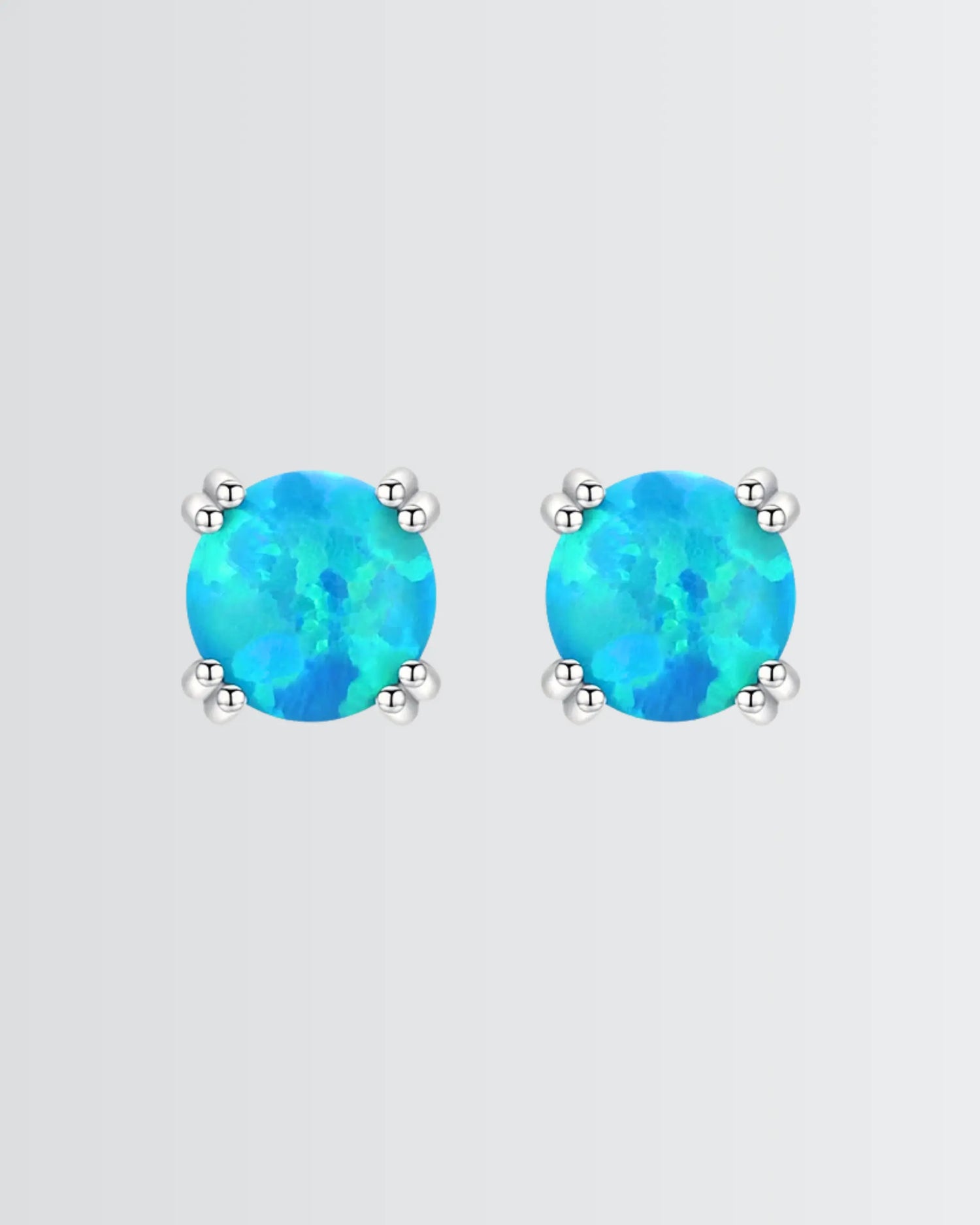 Let Your Ears Catch The Glow Studs -  Silver Earrings by BLINGLANE