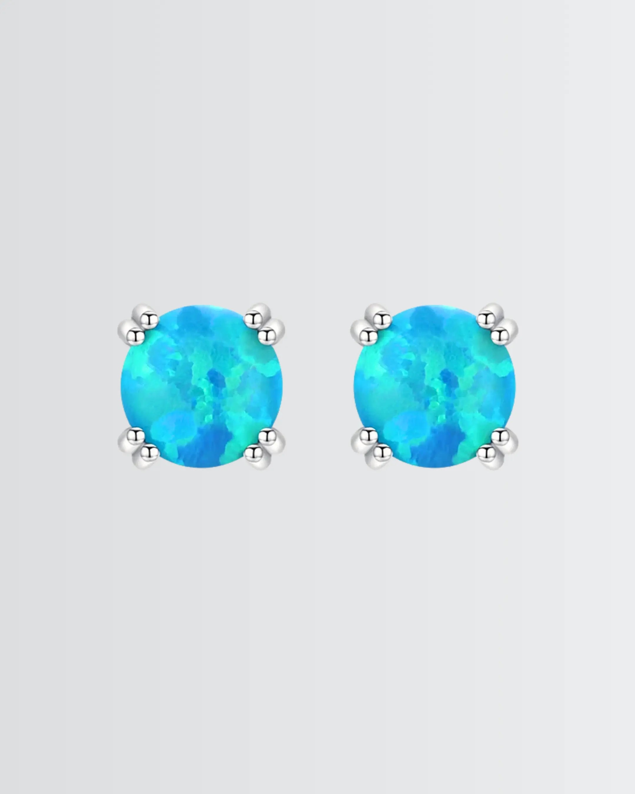 Let Your Ears Catch The Glow Studs -  Silver Earrings by BLINGLANE