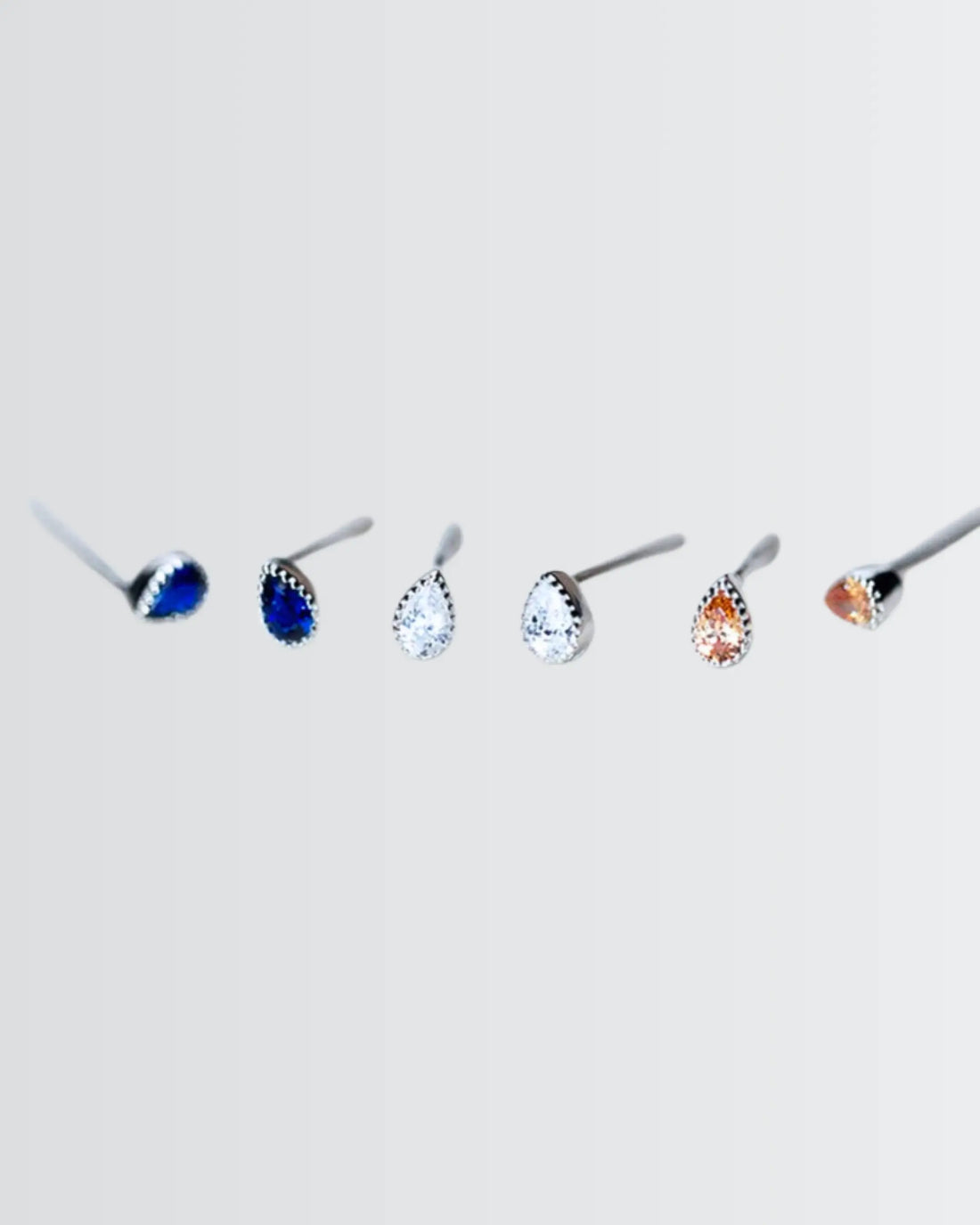 Radiant Teardrop Mini Studs - Silver Earrings by BLINGLANE