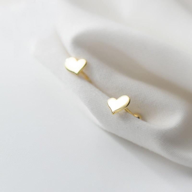 Happy Hearts Tiny Studs - Blinglane